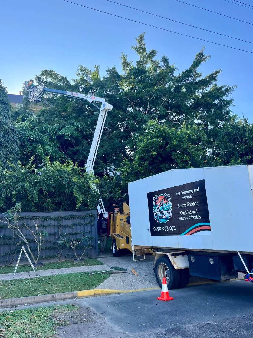 Coral Coast Tree Care truck and EWP on a job